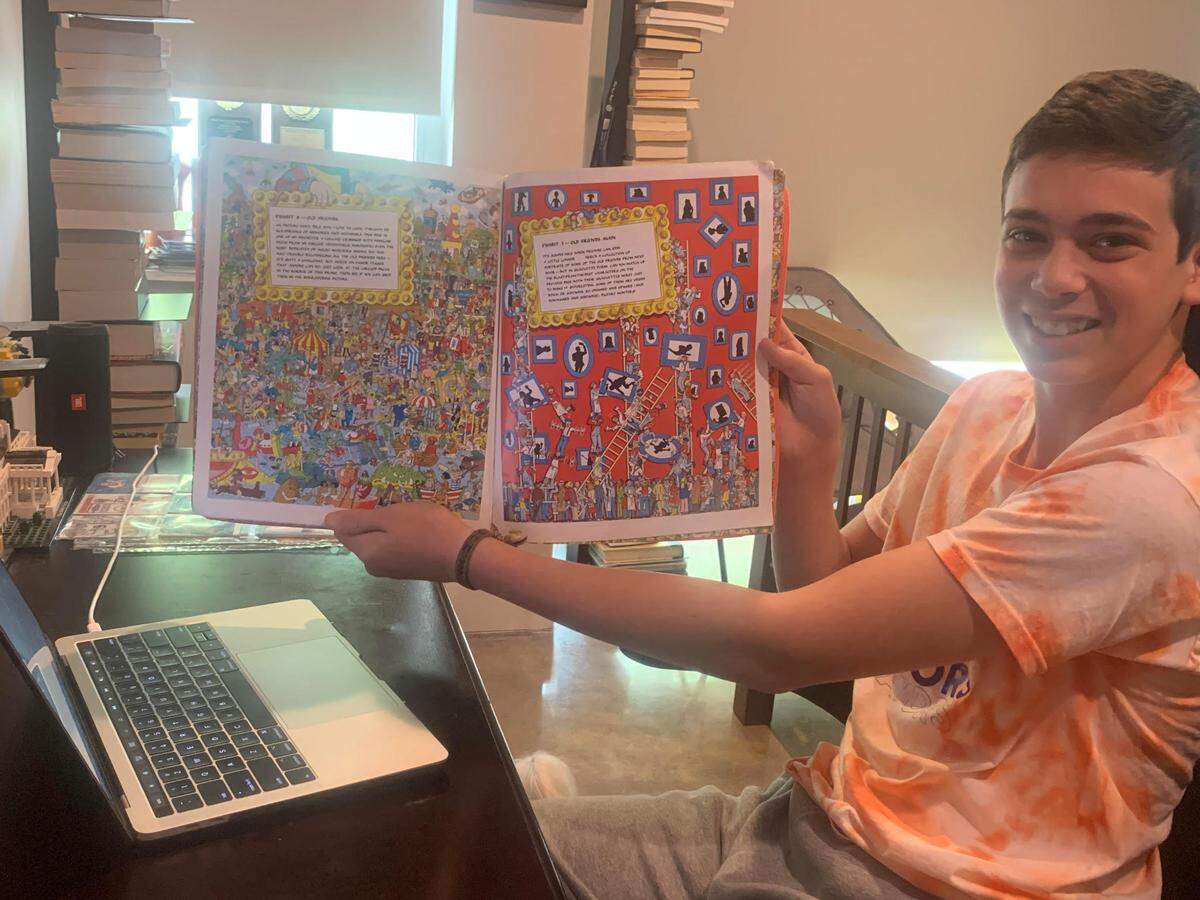 Matthew Lewis, 14, is spending his summer reading to younger kids through the Jewish Community Services and Achieve Miami’s buddy program.