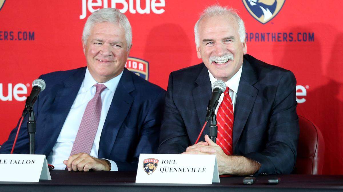 Florida Panthers General Manager Dale Tallon sits alongside new head coach Joel Quenneville at the BB&T Center at an April 8 news conference.
