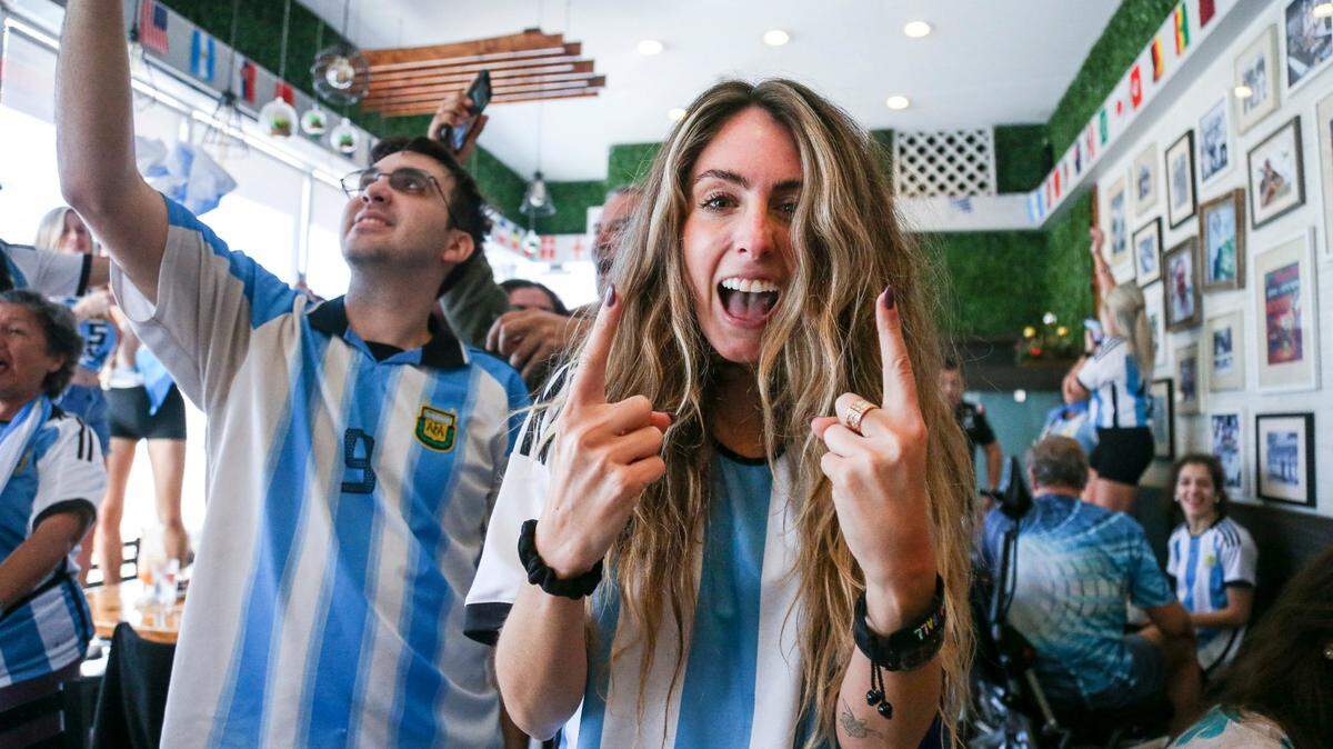 A soccer fan rooting for Argentina celebrates after a goal against Croatia during a World Cup watch party at restaurant Manolo in Miami Beach, Tuesday, Dec. 13, 2022. Argentina won, and faces France Sunday, Dec. 18.