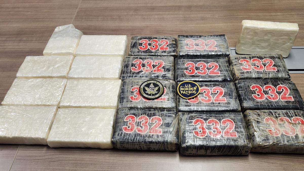 Kilograms of cocaine are displayed on a table by the Monroe County Sheriff’s Office. The drugs were seized Monday, Jan. 19, 2026, after detectives arrested a charter fishing boat captain accused of selling cocaine he found floating at sea.