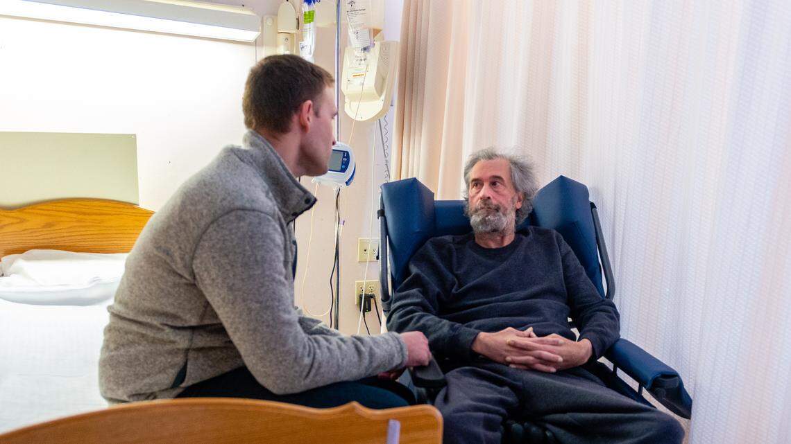 Phil Levering (left) says his father, Mark Levering, used to have a calm demeanor but now exhibits signs of aggression due to a brain injury he suffered after a surgery gone wrong.