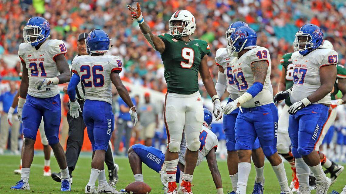 Miami Hurricanes tight end Brevin Jordan (9) signals a first down on his pass reception in the first quarter as the University of Miami hosts Savannah State at Hard Rock Stadium in Miami Gardens on Saturday, September 8, 2018.