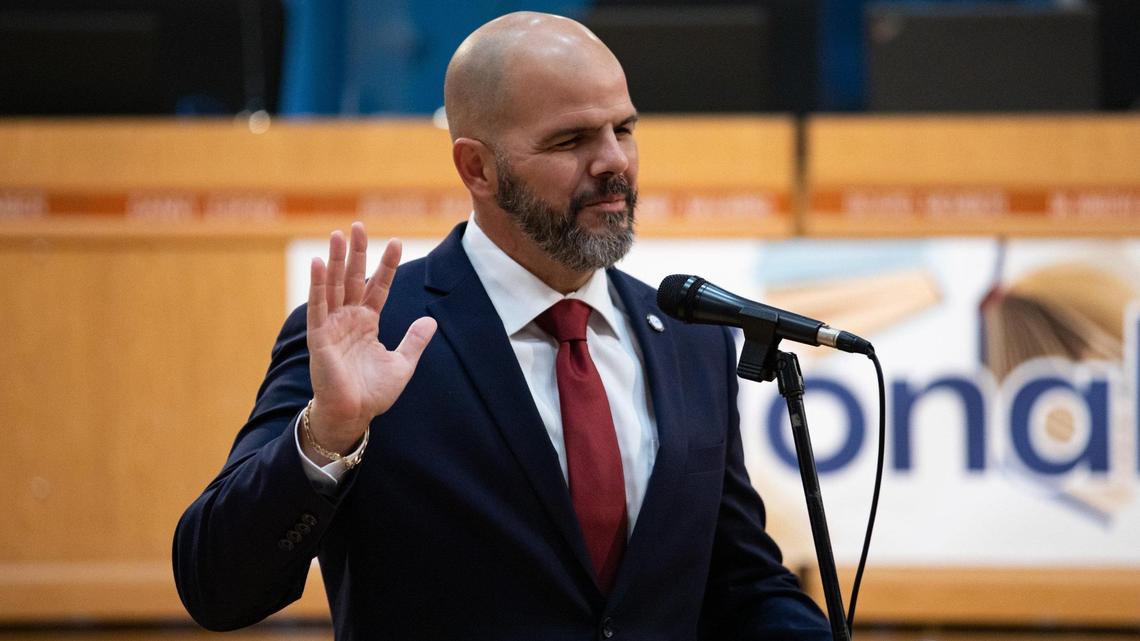 Roberto Alonso, one of two newly elected Miami-Dade County School Board members, is revisiting which flags can be displayed in a school classroom, a measure that was withdrawn from the board’s agenda last month after community pushback. In this photo, he is being sworn into the School Board on Nov. 22, 2022.