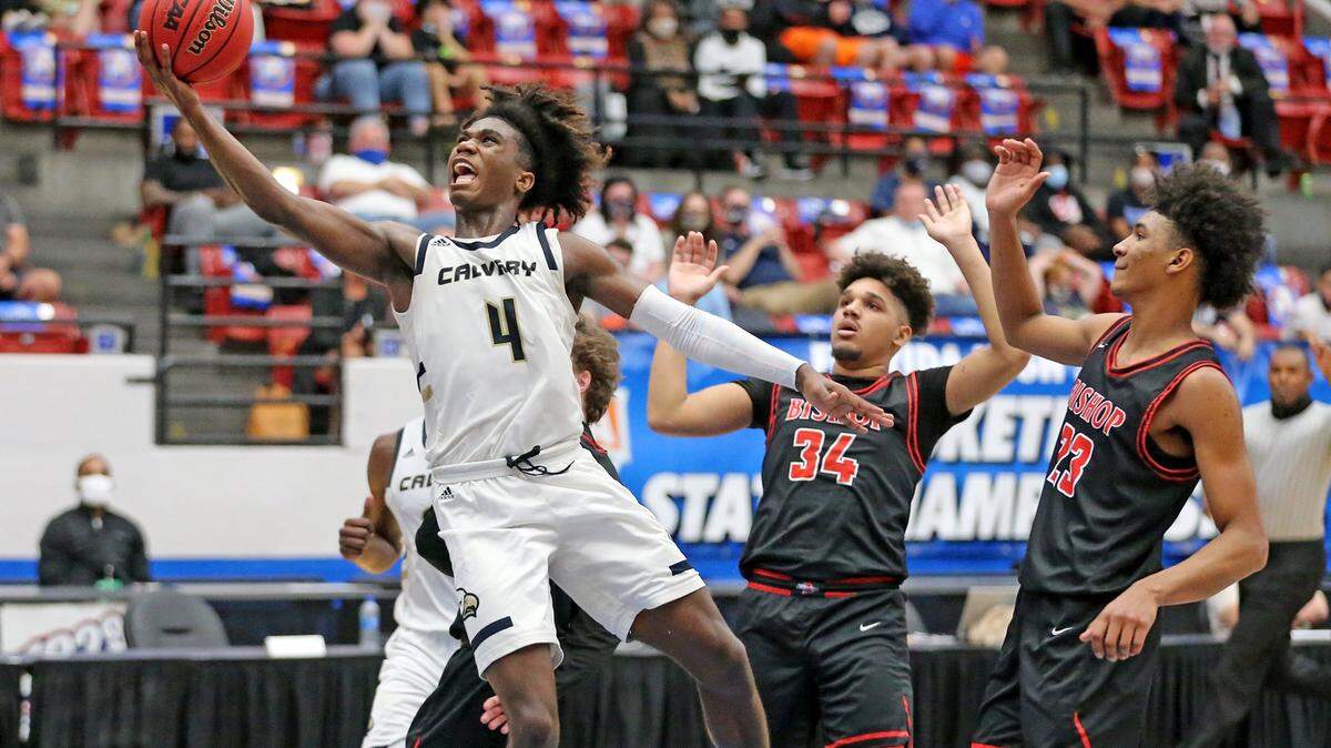 Calvary Christian Marvel Allen (4) as they play Bishop McLaughlin in the FHSAA 3A Boys’ Basketball finals in Lakeland, Florida, Friday, March 5, 2021.