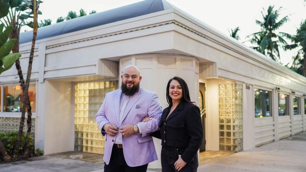 Jeff and Laura Budnechky outside the new home for Apocalypse BBQ in Kendall.