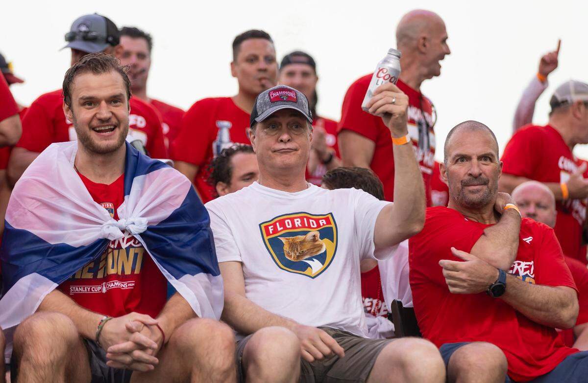 Florida Panthers center Aleksander Barkov (16), head coach Paul Maurice and general manager Bill Zito are seen on stage during a Stanley Cup victory parade rally at the Fort Lauderdale Beach Park off A1A on Sunday, June 30, 2024, in Fort Lauderdale, Fla. The parade was held to celebrate the Florida Panthers after they defeated the Edmonton Oilers in Game 7 of the Stanley Cup Final.