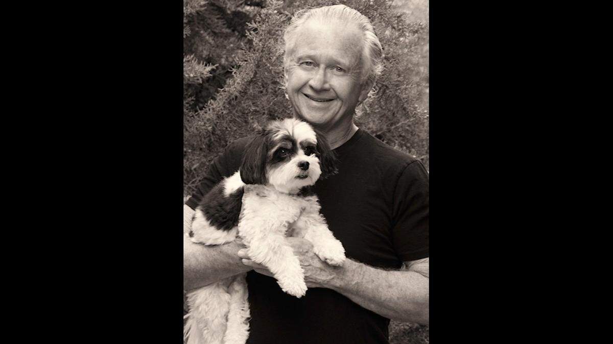 Marc Watson with his dog, Will.