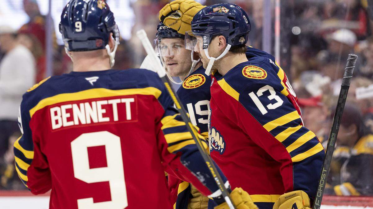 Florida Panthers left wing Matthew Tkachuk (19) celebrates with his teammates after scoring against the Boston Bruins in the second period of their NHL game at the Amerant Bank Arena on Wednesday, Feb. 4, 2026, in Sunrise, Fla.