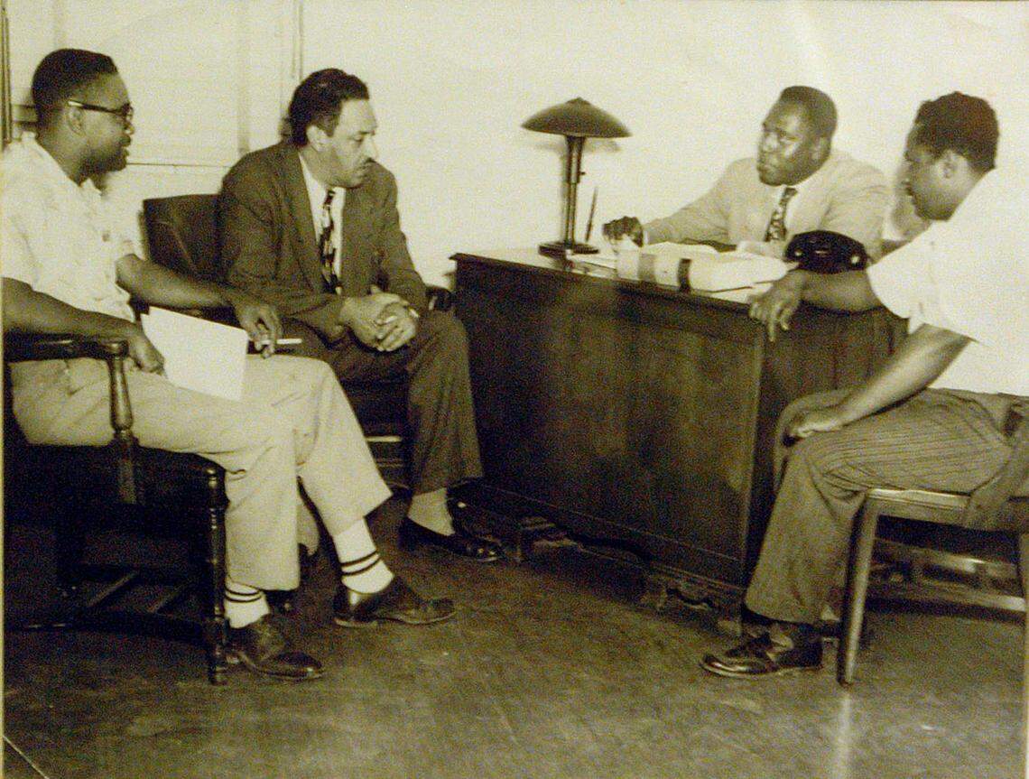 John Johnson was one of the few black attorneys in Miami in the 1940s and became the second black judge to serve in the area. In an old photo are, from left, Garth Reeves, publisher of The Miami Times; Thurgood Marshall, who would go on to become a Supreme Court justice; John Johnson; and G.E. Graves discussing the desegregation of the Miami Springs golf course in 1949.