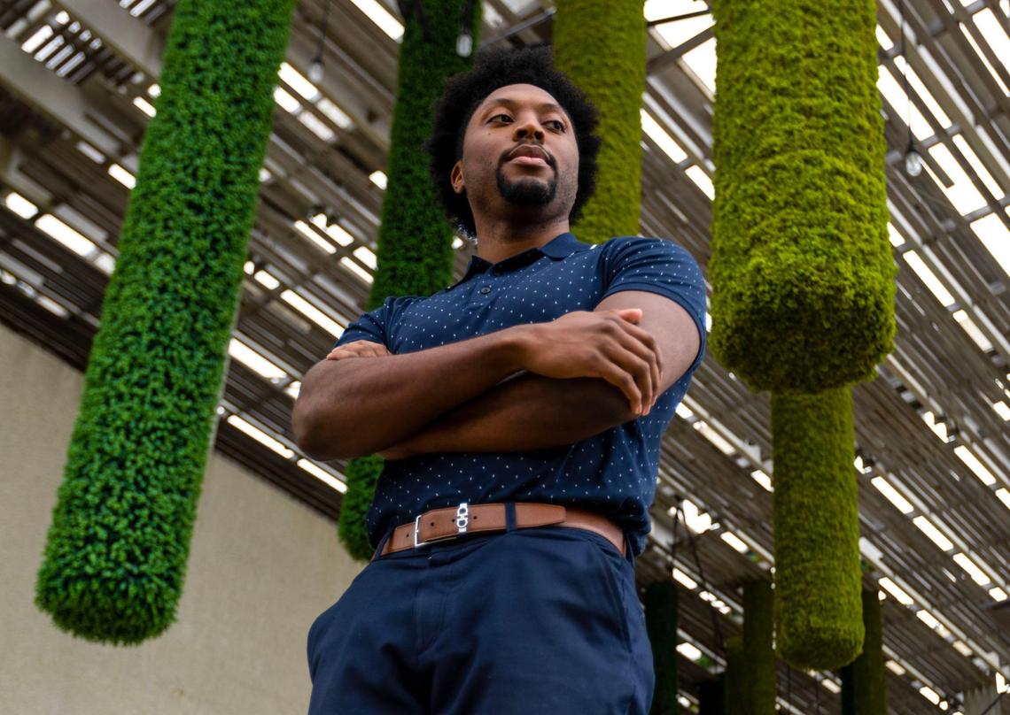 Venture Miami executive director Erick Gavin strikes a pose at Pérez Art Museum Miami in Miami, Florida, on Monday, November 21, 2022.