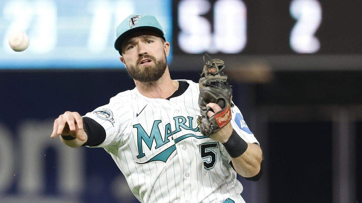 Miami Marlins short stop Jon Berti (5) throws to first against the Arizona Diamondbacks during the sixth inning at loanDepot Park on Friday, April 14, 2023.