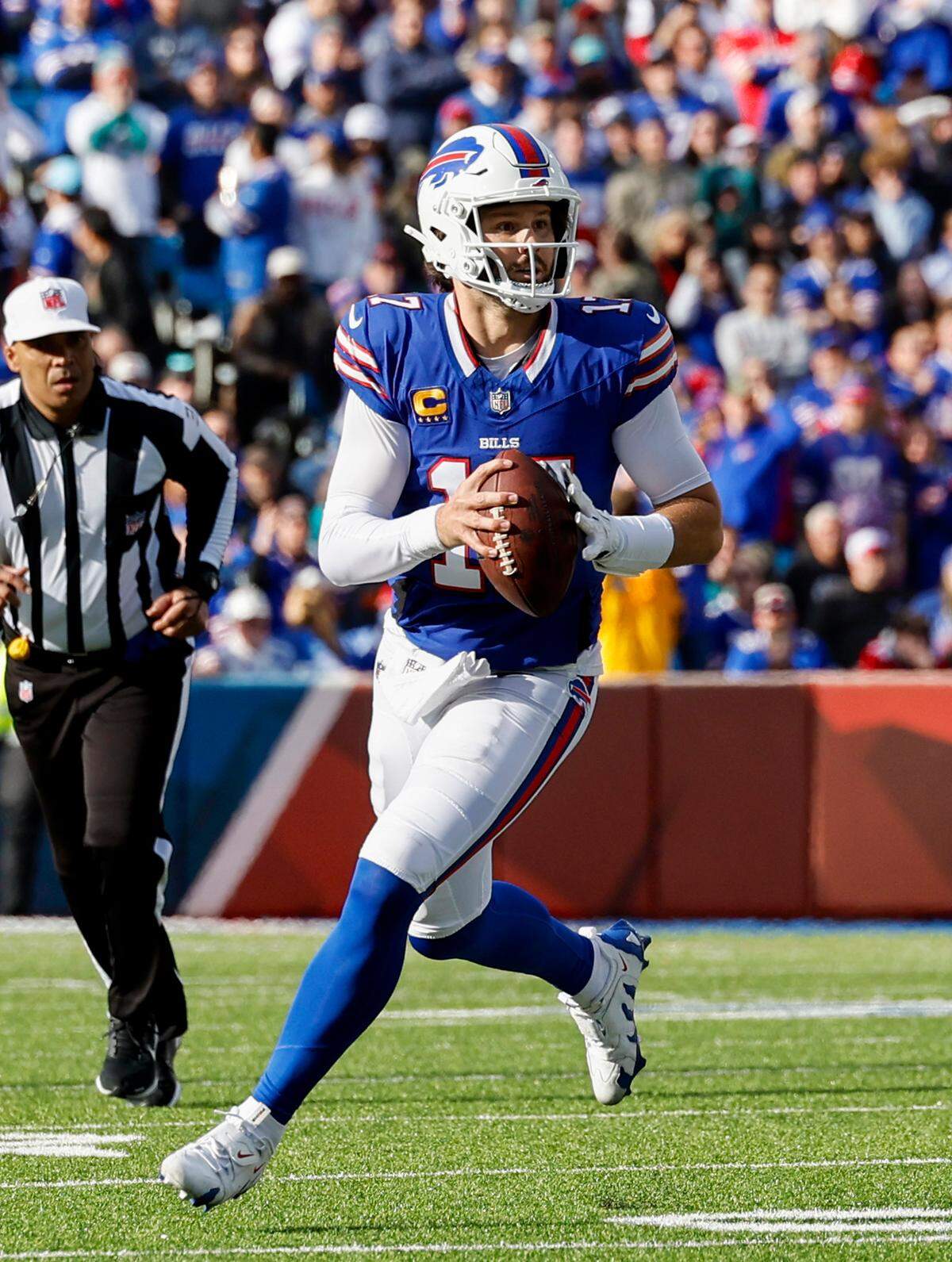 Buffalo Bills quarterback Josh Allen (17) sets up to pass in the first half during their NFL game against the Miami Dolphins at Highmark Stadium on Sunday, Nov. 3, 2024, in Orchard Park, New York.