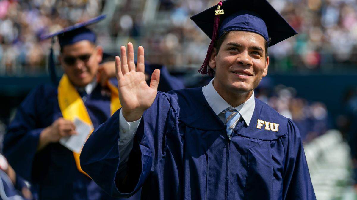Florida International University students attend their graduation ceremony inside FIU’s Riccardo Silva Stadium in Miami, Florida on Saturday, April 30, 2022.