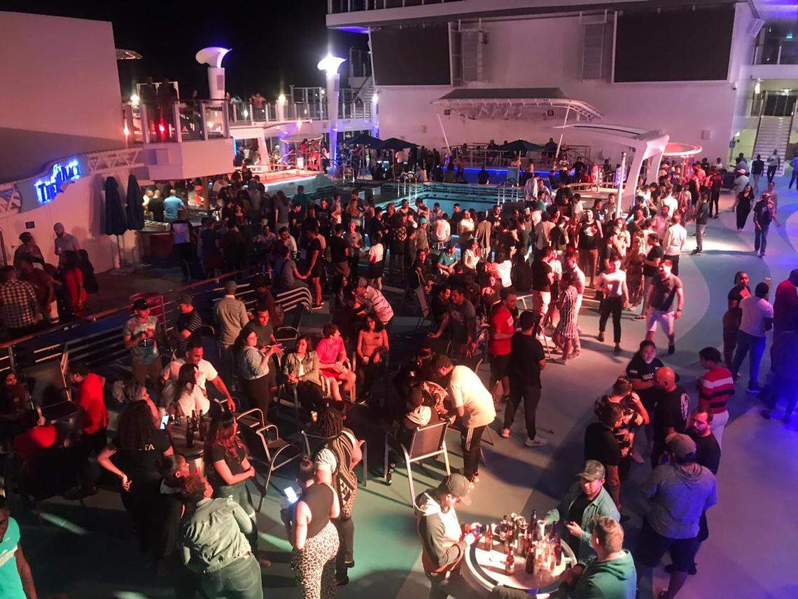 Norwegian Cruise Line crew members continue to sleep two to a cabin and gather in crowded spaces without any face coverings or social distancing, against guidelines from the U.S. Centers for Disease Control and Prevention.