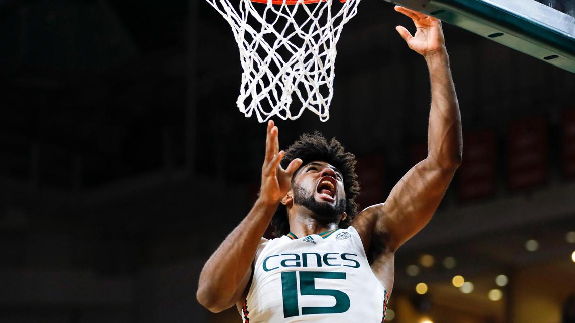 Miami Hurricanes forward Norchad Omier (15) jumps for a rebound during the first half of a basketball game against the Lafayette Leopards at the Watsco Center in Coral Gables, Florida, Monday, November 7, 2022.