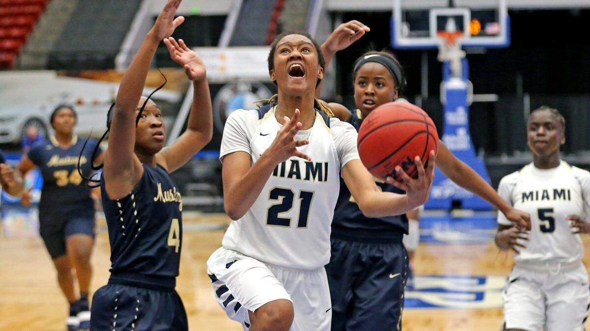 Miami High Colleen Bucknor leaps for a basket as they play Wekiva HS in the 9A Finals Girl’s State Basketball Championships at the RP Funding Center in Lakeland, Florida, Saturday, March, 2, 2019.