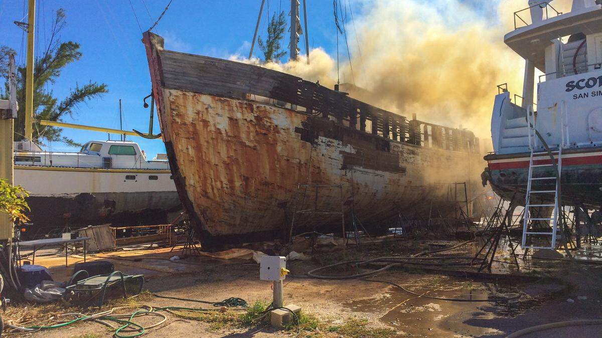 An abandoned boat burned Monday, Sept. 17, 2018, at a Keys marina.