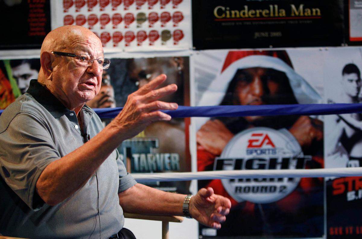 In this Sept. 23, 2010, file photo, Angelo Dundee gestures during an interview at the opening of the new 5th Street Gym in Miami Beach, Fla. Dundee, the trainer who helped groom Muhammad Ali and Sugar Ray Leonard into world champions and became one of boxing’s most recognizable figures, died Wednesday, Feb. 1, 2012. He was 90.
