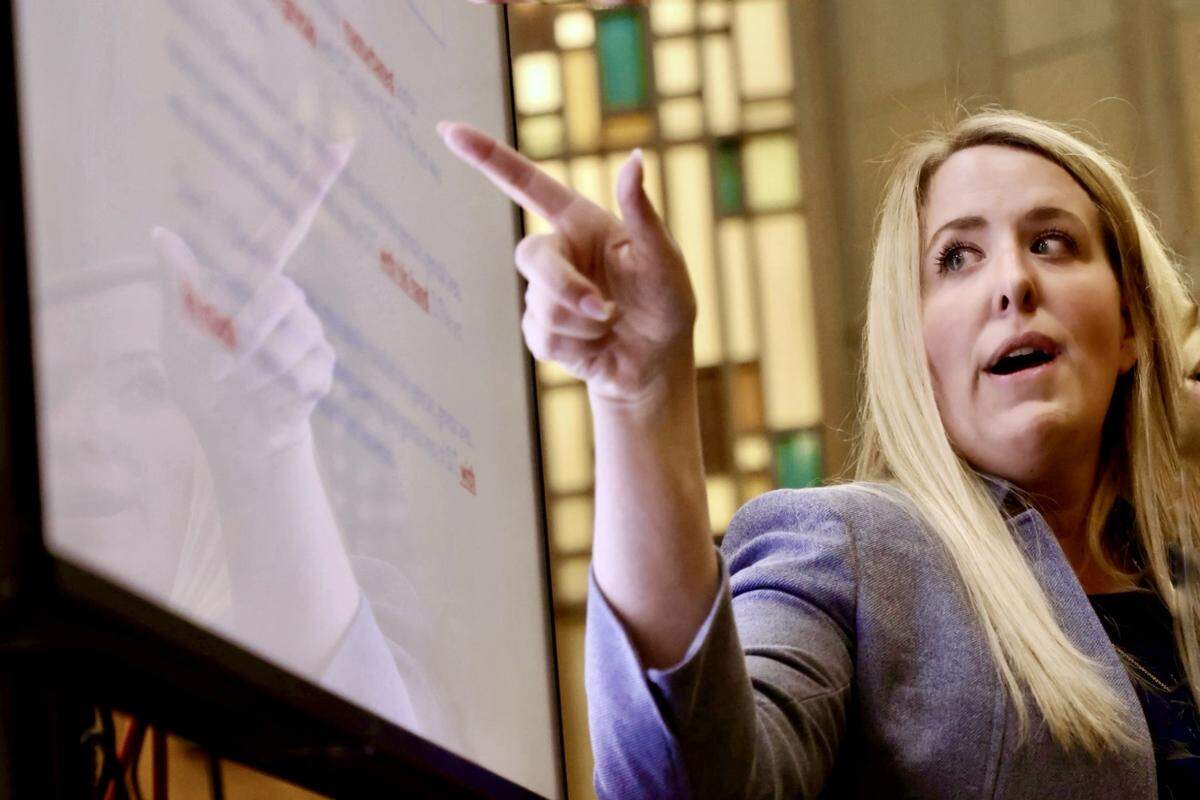 Assistant State Attorney Bronwyn Nayci gives the closing arguments during the sexual battery trial of former Miami-Dade police officer Daniel Ramos-Aviles, far left, on Wednesday, Sept. 3, 2025, in Miami, Florida. 