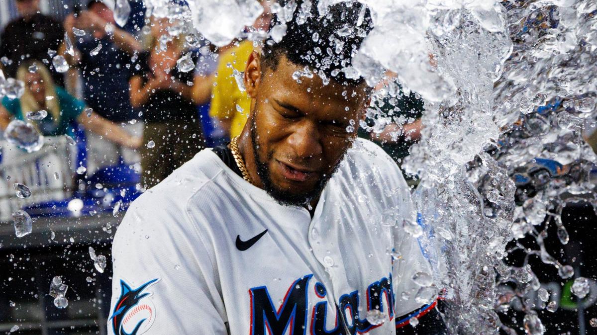 Miami Marlins second baseman Otto Lopez (61) gets water splashed on him after hitting a walk-off single winning the game against the St. Louis Cardinals on Wednesday, June 19, 2024 at loanDepot Park in Miami, Fla.