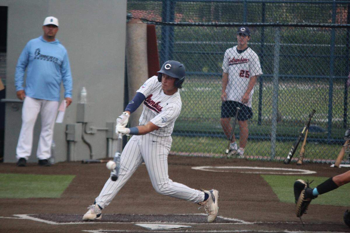 Columbus third baseman Julian Gonzalez hits the ball during Saturday night’s 7-2 win over West Broward in a Region 4-7A semifinal on Saturday at the Explorers’ home field.