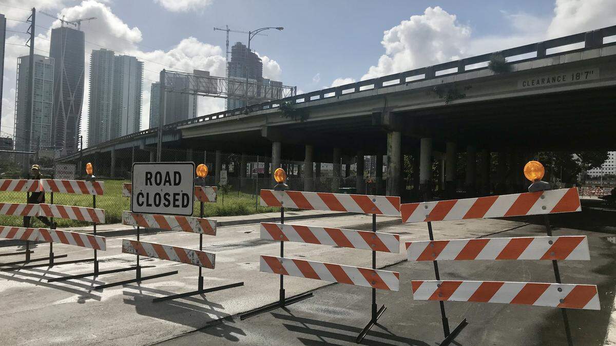Miami officials have closed four streets under the 836 expressway in Overtown as health officials investigate the spread of HIV and hepatitis C.