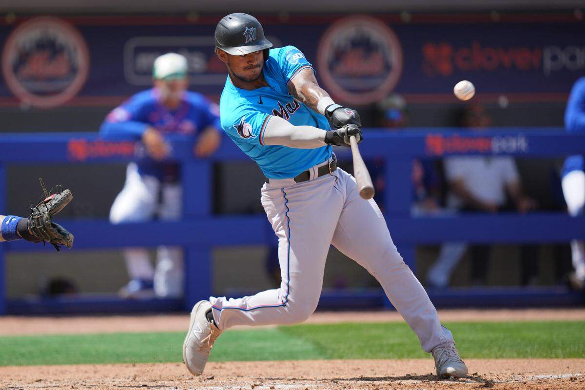 Mar 17, 2024; Port St. Lucie, Florida, USA;  Miami Marlins center fielder Dane Myers (54) hits a home run in the third inning against New York Mets at Clover Park.