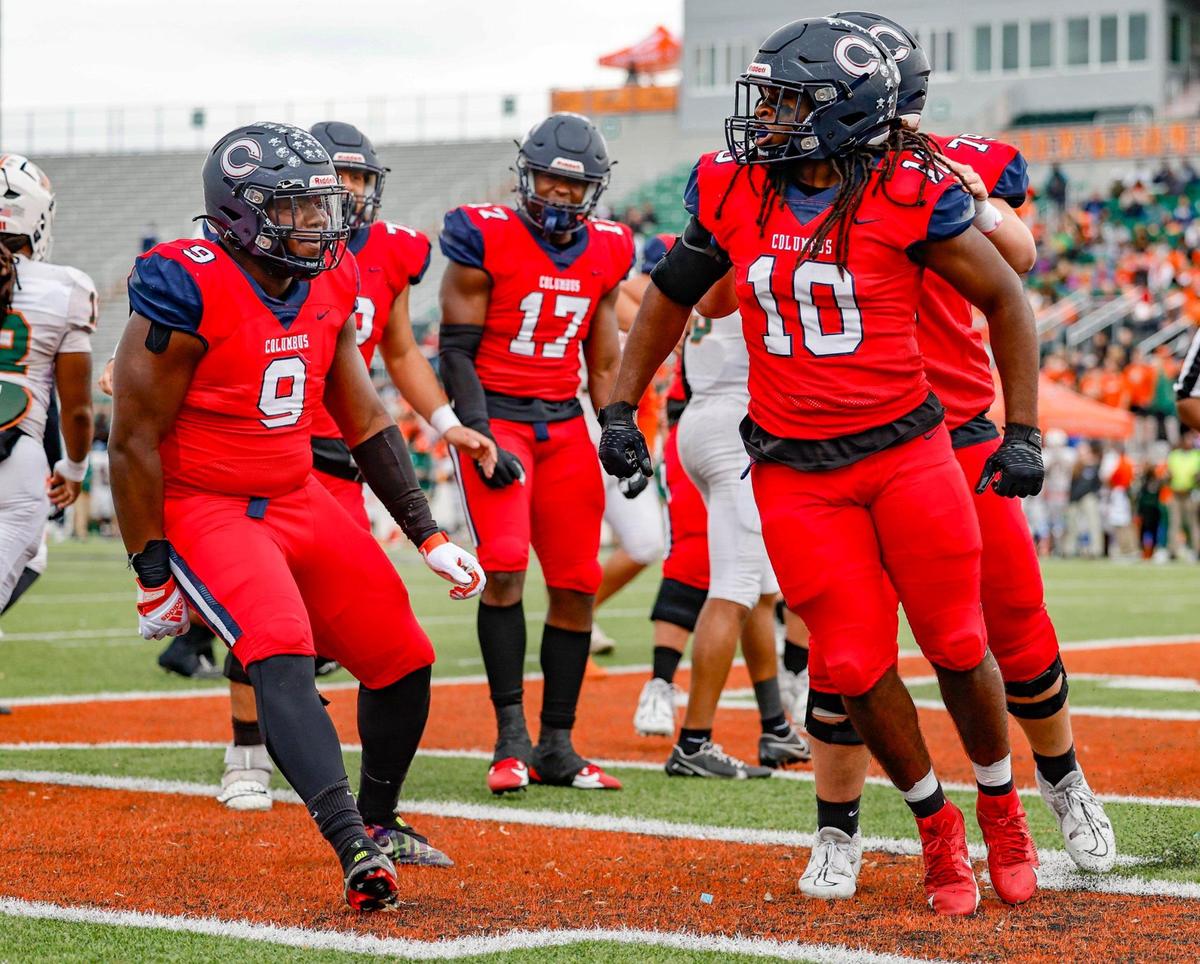 Columbus Explorers Hector Chavez (10), Daylen Russell (9), and teammates react after Chavez scores against the Mandarin Mustangs in the first half during the FHSAA State Championships, Class 4M, at Bragg Memorial Stadium in Tallahassee, Florida, on Friday, December 8, 2023.