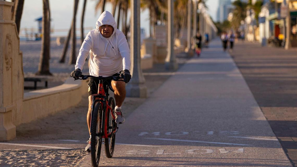 Hollywood posted one of the biggest apartment rent increases last month in South Florida. In this photo, a cyclist rides on the Hollywood Beach Broadwalk on Saturday, Jan. 14, 2023.