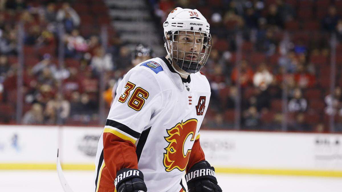 Calgary Flames right wing Troy Brouwer (36) pauses on the ice during the first period of a February game against the Arizona Coyotes in Glendale, Ariz.