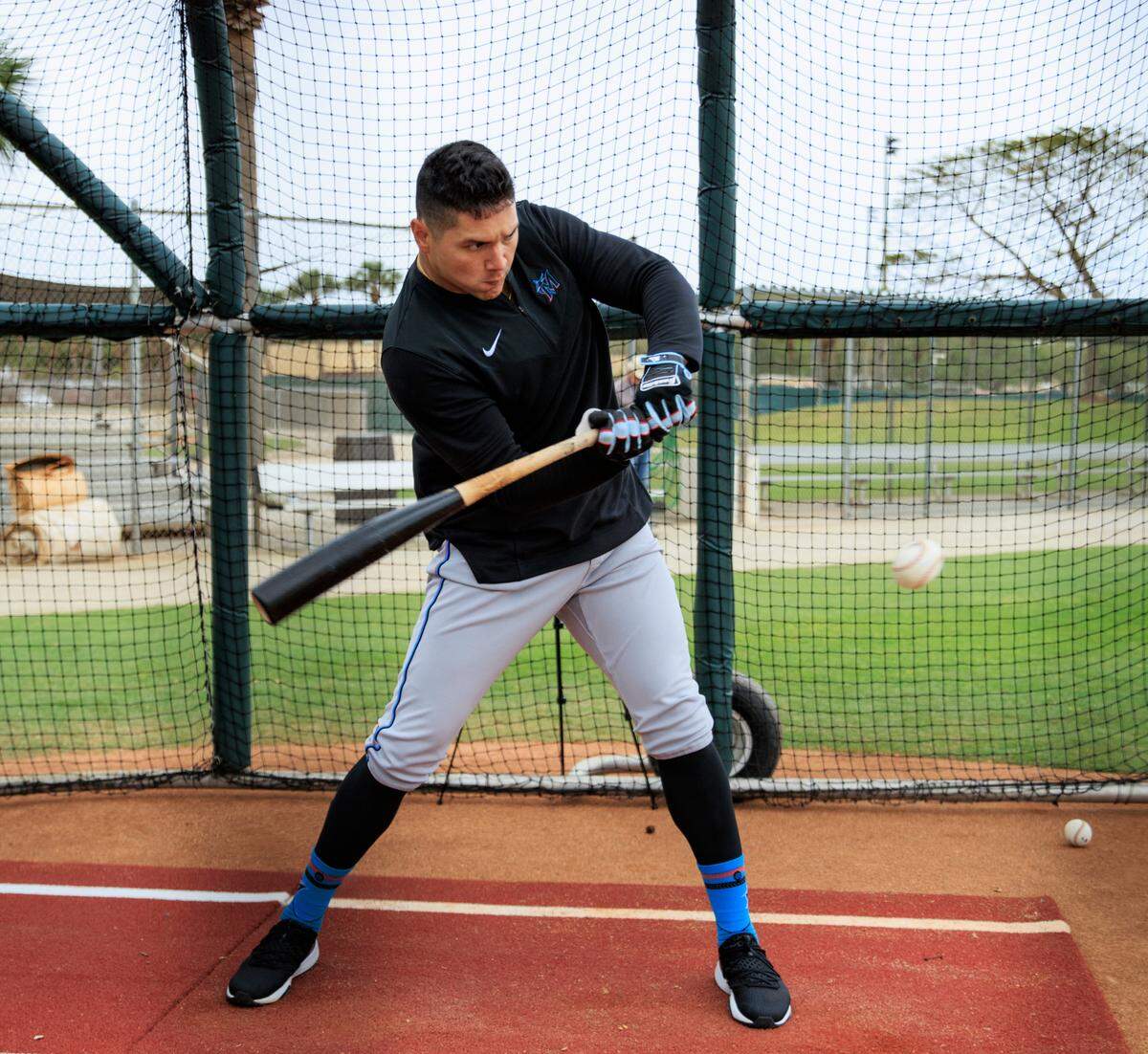 Miami Marlins right fielder Avisail Garcia bats during batting practice in their spring training workout at Roger Dean Stadium on Tuesday, March 15, 2022, in Jupiter.