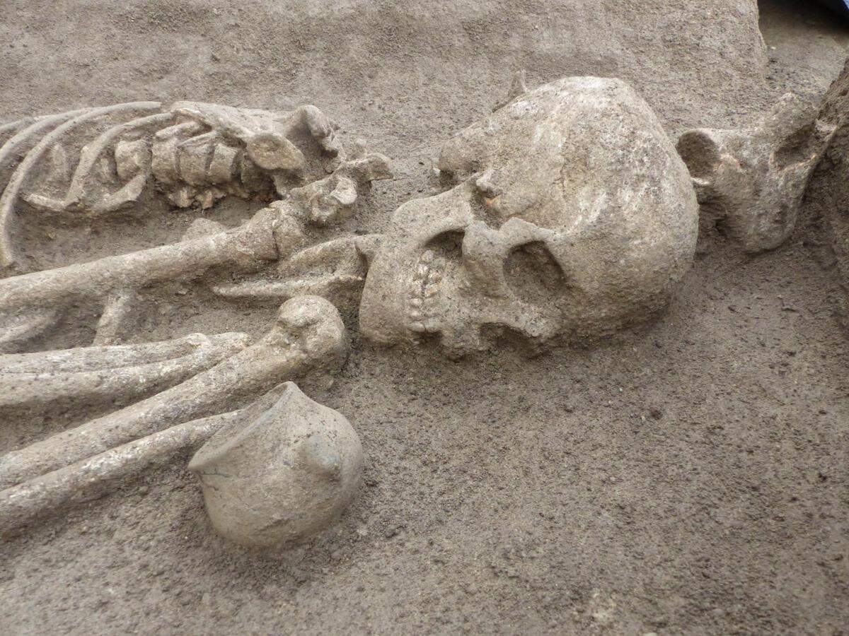 The vase was buried near the deceased’s head.