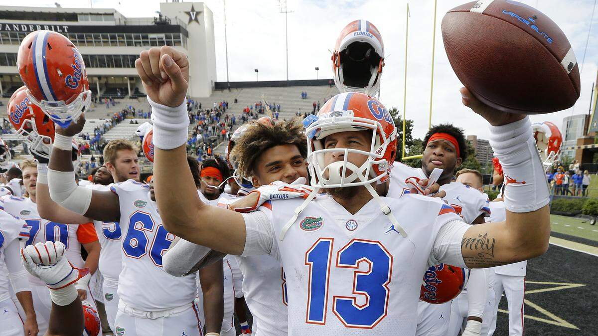 Florida quarterback Feleipe Franks (13) celebrates after the Gators defeated Vanderbilt 37-27 on Saturday, Oct. 13, 2018, in Nashville, Tenn.