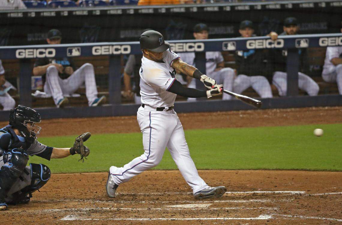 Miami Marlins left fielder Harold Ramirez (47) hits a single during the eighth inning of an interleague Major League Baseball game against the Tampa Bay Rays at Marlins Park in Miami, Tuesday, May 14, 2019.