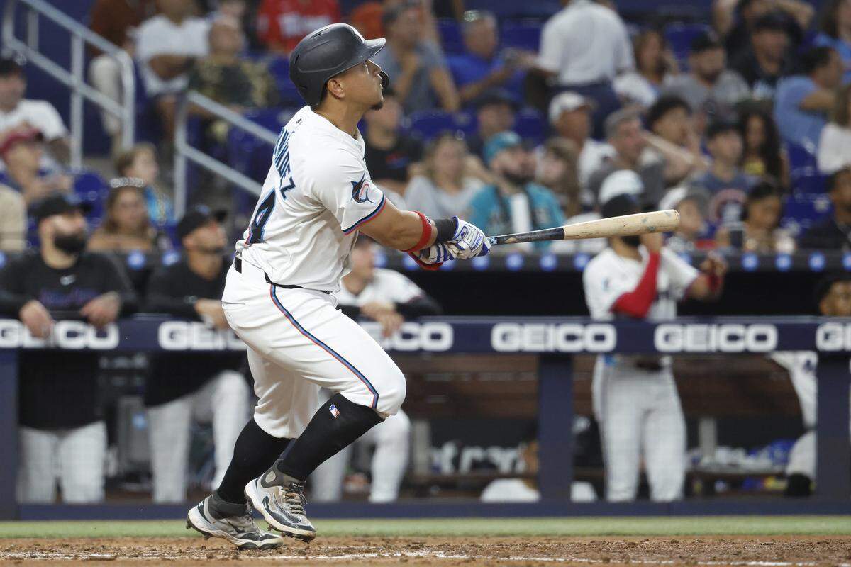 Aug 6, 2025; Miami, Florida, USA;  Miami Marlins right fielder Heriberto Hernandez (64) watches his home run against the Houston Astros during the third inning at loanDepot Park. Mandatory Credit: Rhona Wise-Imagn Images