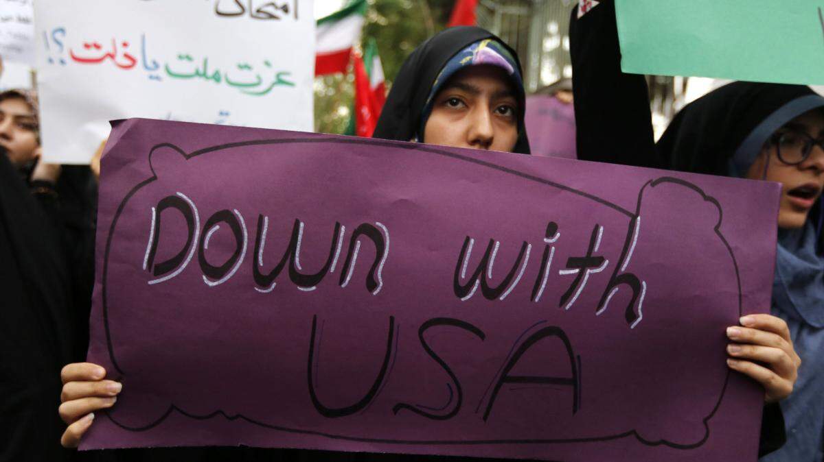 In 2018, Iranian women demonstrate outside the former U.S. embassy headquarters in Tehran, the capital.