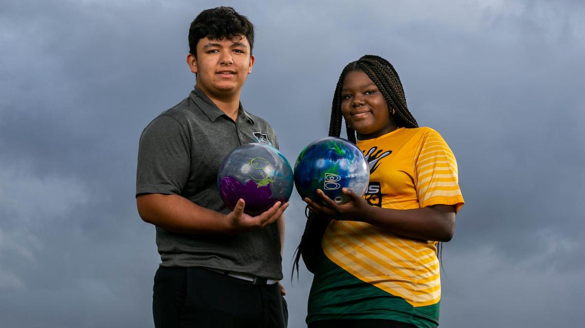 Broward Bowling Players of the Year Colin Boisvert, from Archbishop McCarthy, and Allysa Metellius, from Nova High School, are photographed at Brian Piccolo Park in Hollywood, Florida on Tuesday, January 11, 2022.