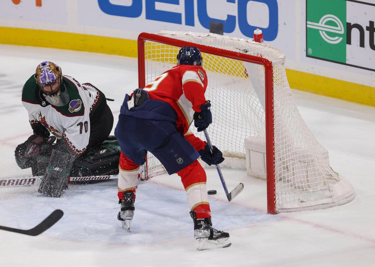 Florida Panther’s left wing Matthew Tkachuk (19) scores a goal passes Arizona Coyotes goalie Karel Vejmelka (70) during the second period of a NHL game between the Florida Panthers and the Arizona Coyotes on Tuesday, Jan. 3, 2023, at FLA Live Arena in Sunrise, Fla. The Panther’s were up 5-3 at the end of the second period.