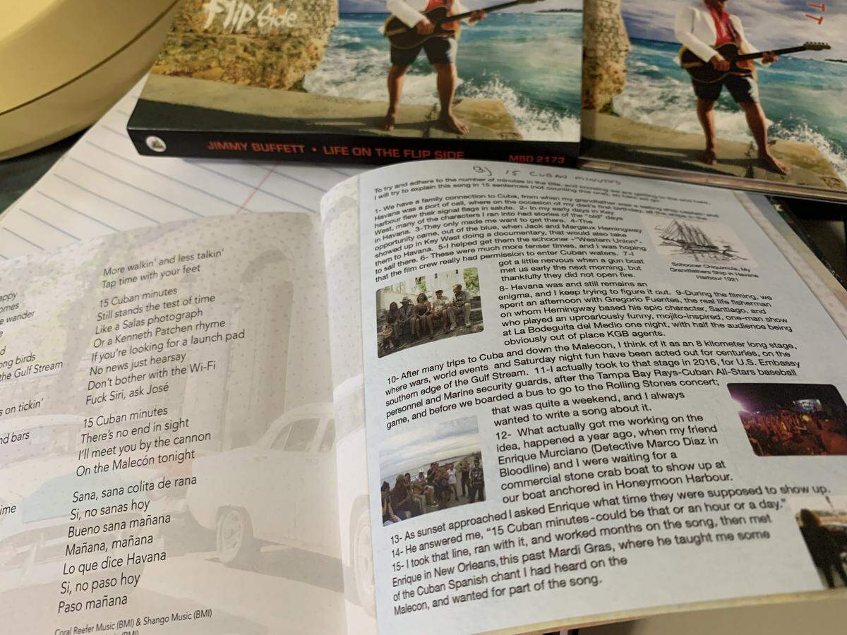 The lyric booklet for Jimmy Buffett’s new “Life on the Flip Side” album includes the story of the song “15 Cuban Minutes” that he wrote with “Bloodline” actor Enrique Murciano and longtime musical partner Michael Utley. The album was recorded in January 2020 in Key West and released May 29, 2020 through Buffett’s Mailboat Records.