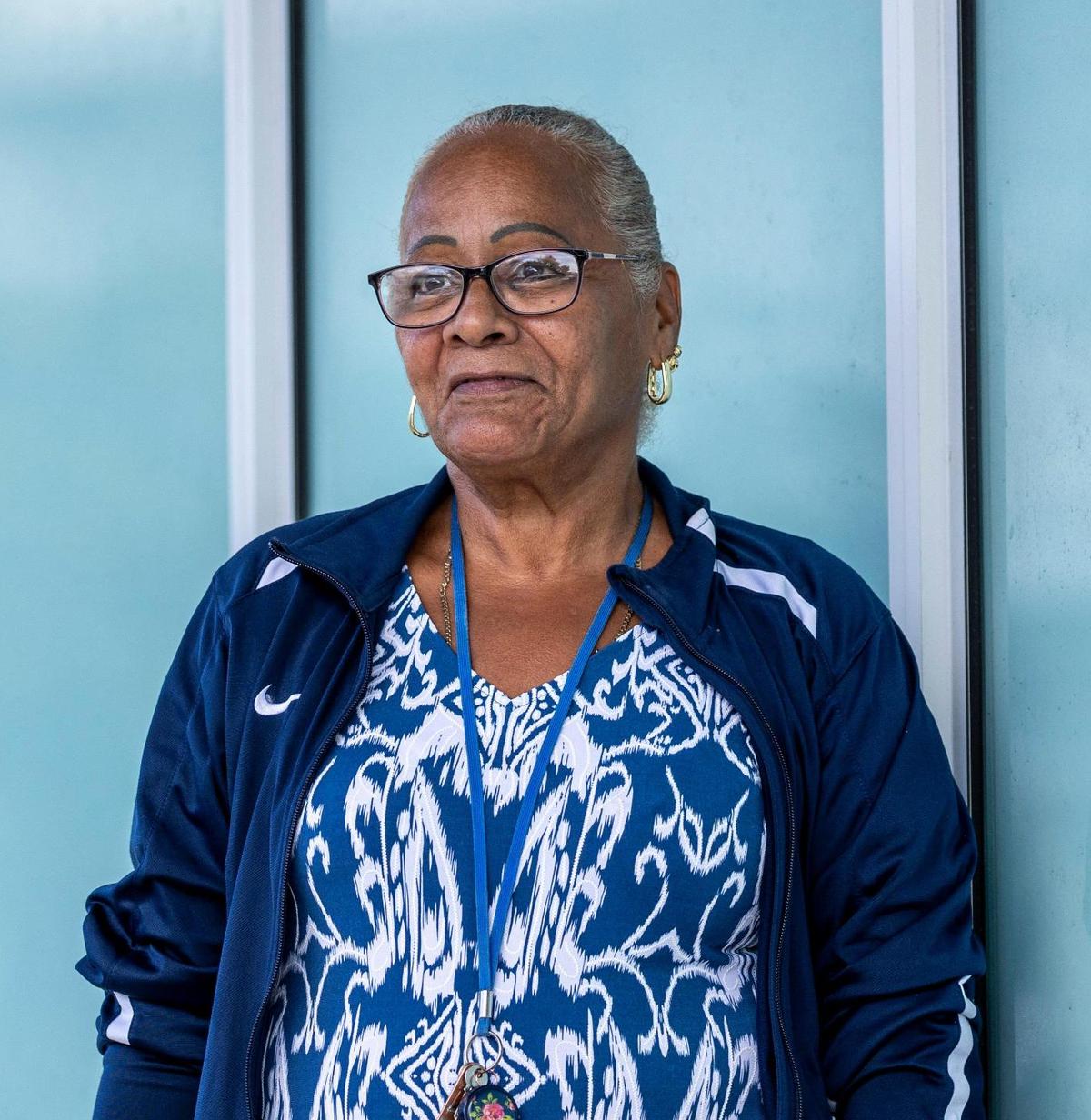 Amparo Nuviola works as a seamstress at a Goodwill factory in Miami. She is two months behind in paying the rent for the small room she had to move into after the rent on her apartment was raised.