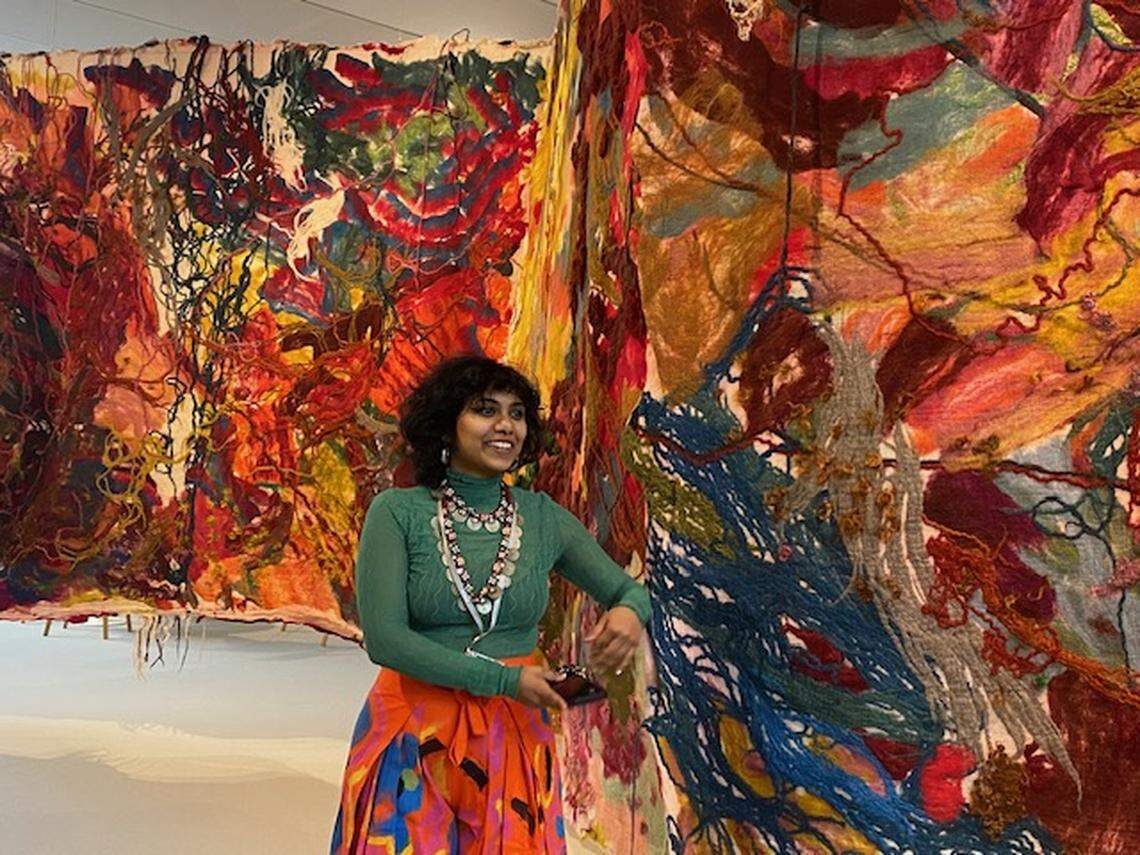 Artist Sagarika Sundaram with her work, “Released Form,” at Art Basel.