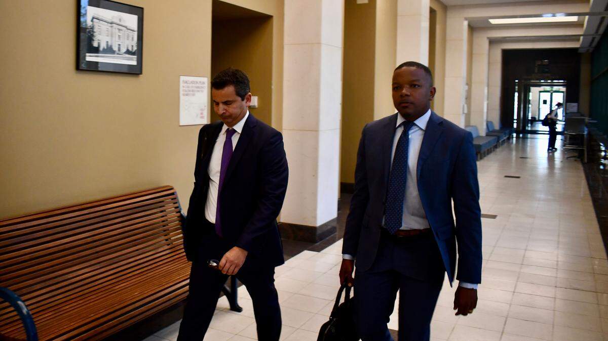 Former Hope Florida Foundation President Joshua Hay, right, leaves the Leon County Courthouse on Wednesday, Oct. 15, 2025.