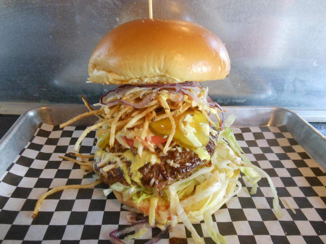 Squash these burgers before attempting to take a bite.