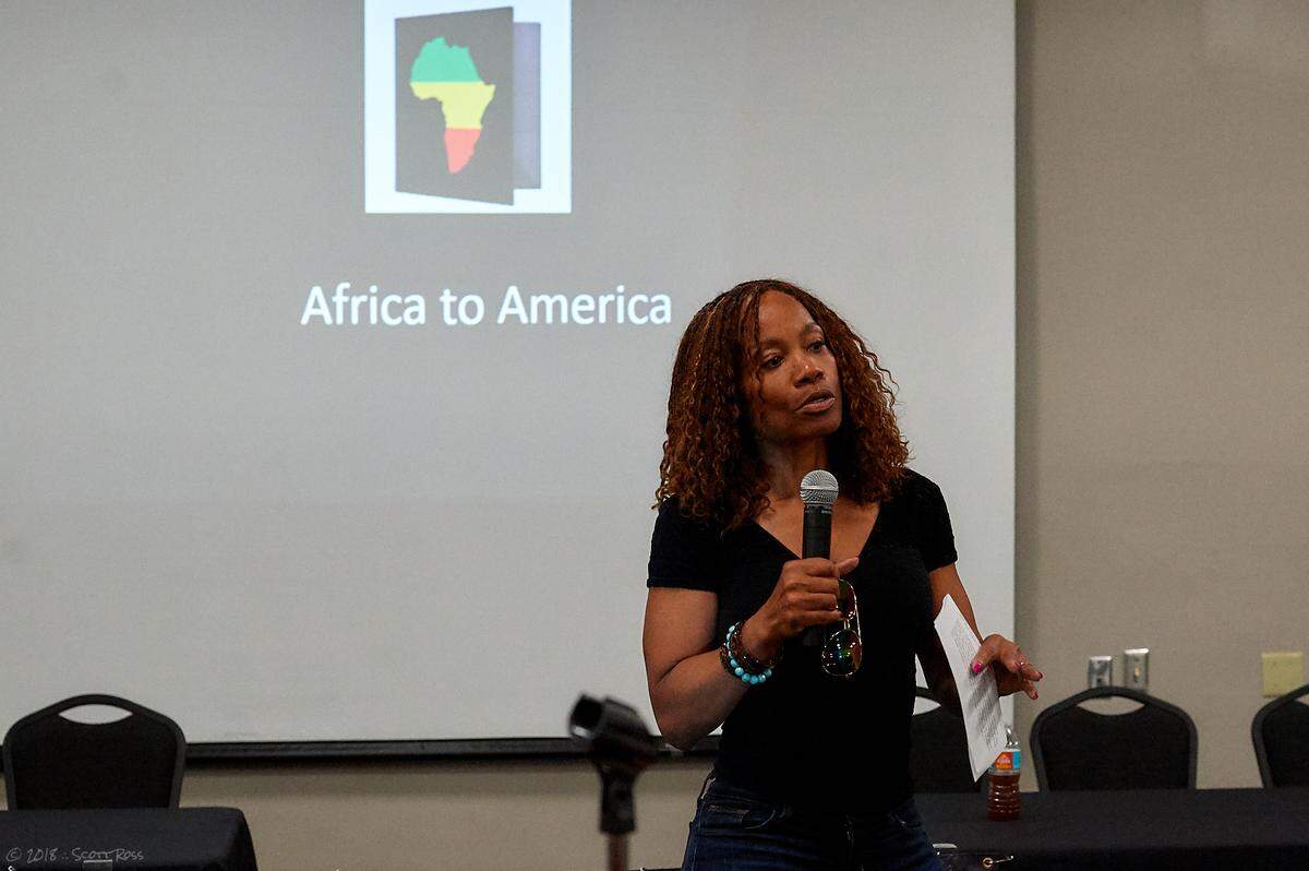 Roni Bennett, South Florida People of Color’s executive director, leads a discussion at the 2018 Miami Women’s March in Miami on Jan. 21, 2018. SFPoC is a nonprofit that provides a platform for racial dialogue with the end goal of eventually eradicating prejudice.