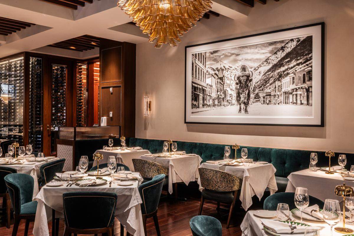 The main dining room at Daniel’s Miami is dominated by a gorgeous David Yarrow photograph of a bison on the streets of Telluride, Colorado, signaling the restaurant’s switch from a fully Italian menu to a focus on steak.