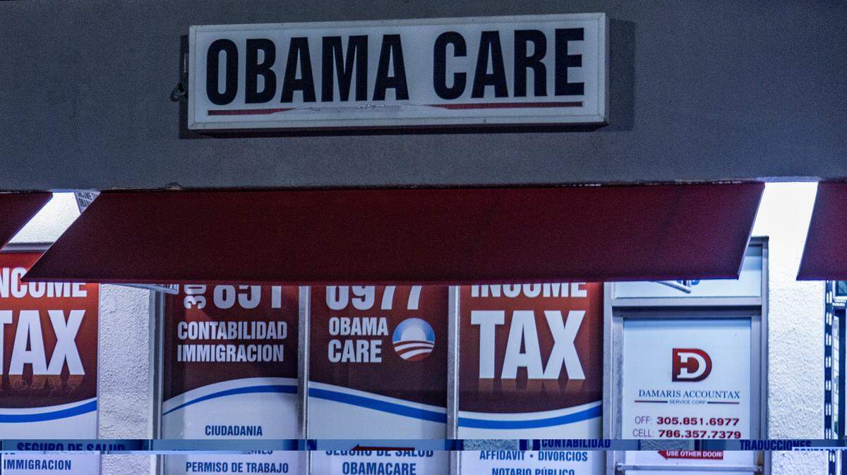 View of an Obamacare sign on the front of the Damaris Accountax Services office in Hialeah on Tuesday, Jan. 9, 2024.