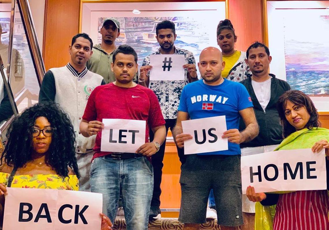 Gan Sungaralingum, top center, poses for a photo with other cruise ship employees stranded onboard the Island Princess on May 14, 2020. Sungaralingum, who sold watches onboard Sky Princess before the pandemic, was then transferred to two other Princess ships during the 170 days he was stuck at sea, trying to get back home to the island of Mauritius, during a global pandemic.