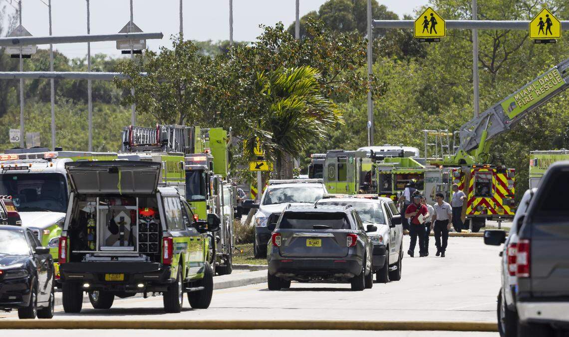 Firefighters work to contain a fire at a six-story warehouse on Thursday, March 5, 2026, in Miami Gardens, Fla.