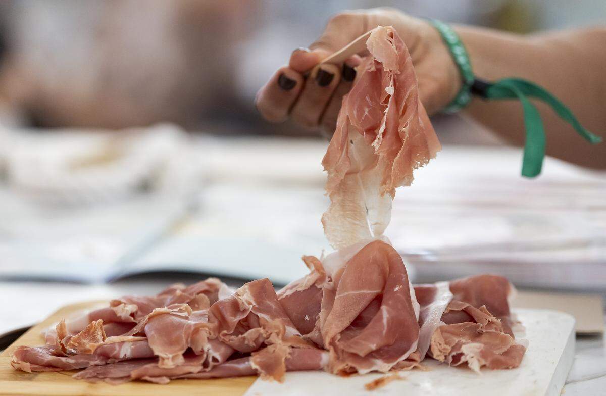 Prosciutto di Carpegna PDO is offered to guests attending the Goya Foods' Grand Tasting Village during the Food Network South Beach Wine & Food Festival on Saturday, Feb. 21, 2026, in Miami Beach, Fla.