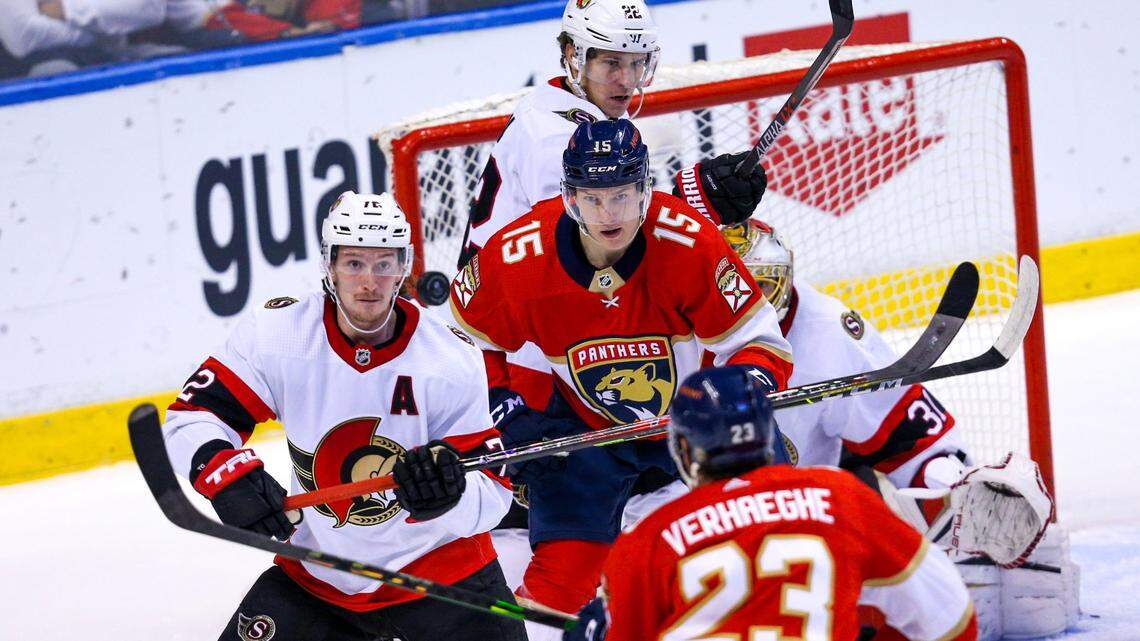 Florida Panthers center Anton Lundell (15) watches the ball fly in the air during the first period of an NHL game against the Ottawa Senators at FLA Live Arena in Sunrise, Florida, on Tuesday, December 14, 2021.